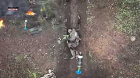 Horrible Footage! Ukrainian drones drop bombs on tens Russian troops hiding in trenches near Bakhmut